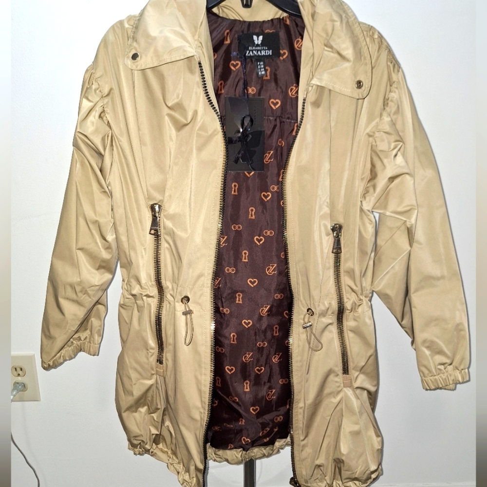 Trenchcoat. Tan shiny color.